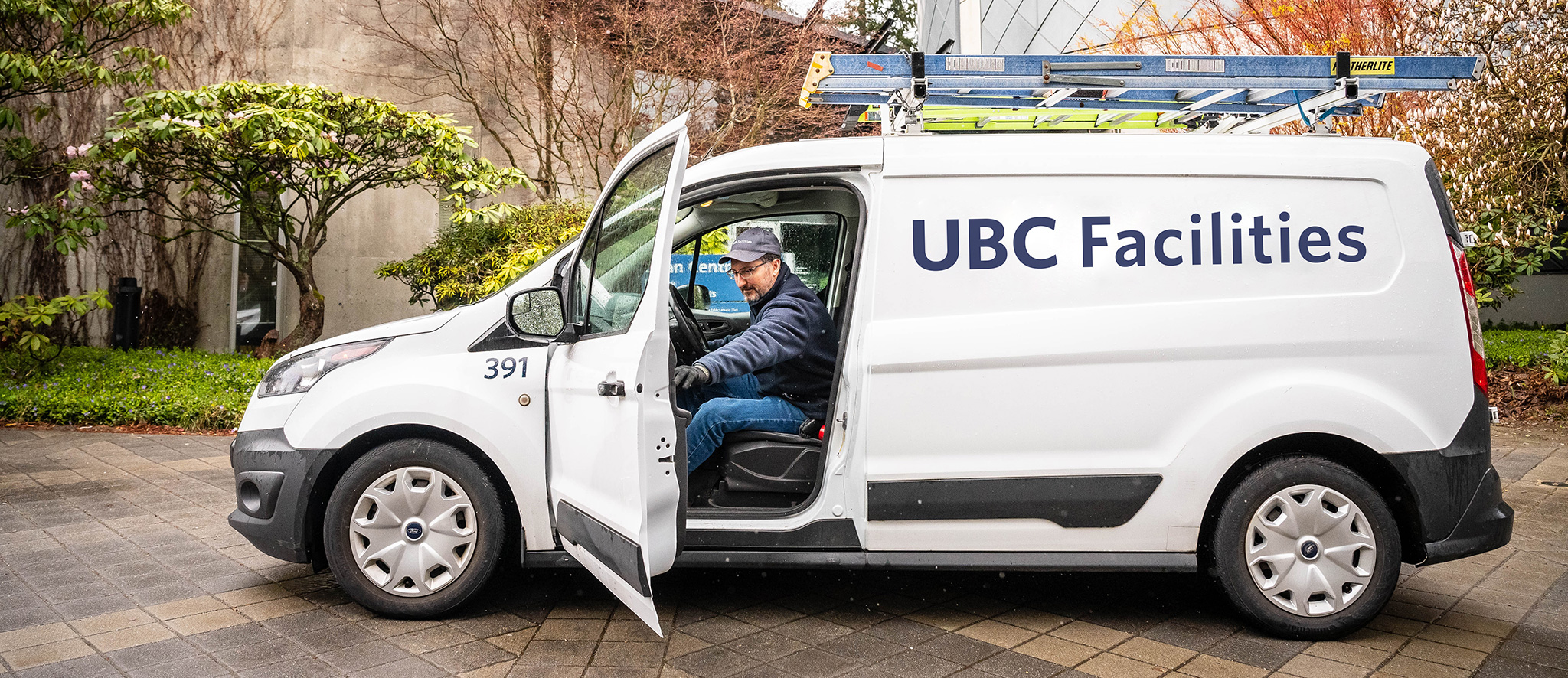 Jeff Georgilas, Utility Worker sitting in a white UBC van